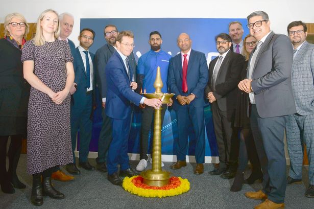 West Midlands Mayor Andy Street (front centre) joins staff from Hexaware and other dignitaries to open the company's new Birmingham office at 3 Brindleyplace